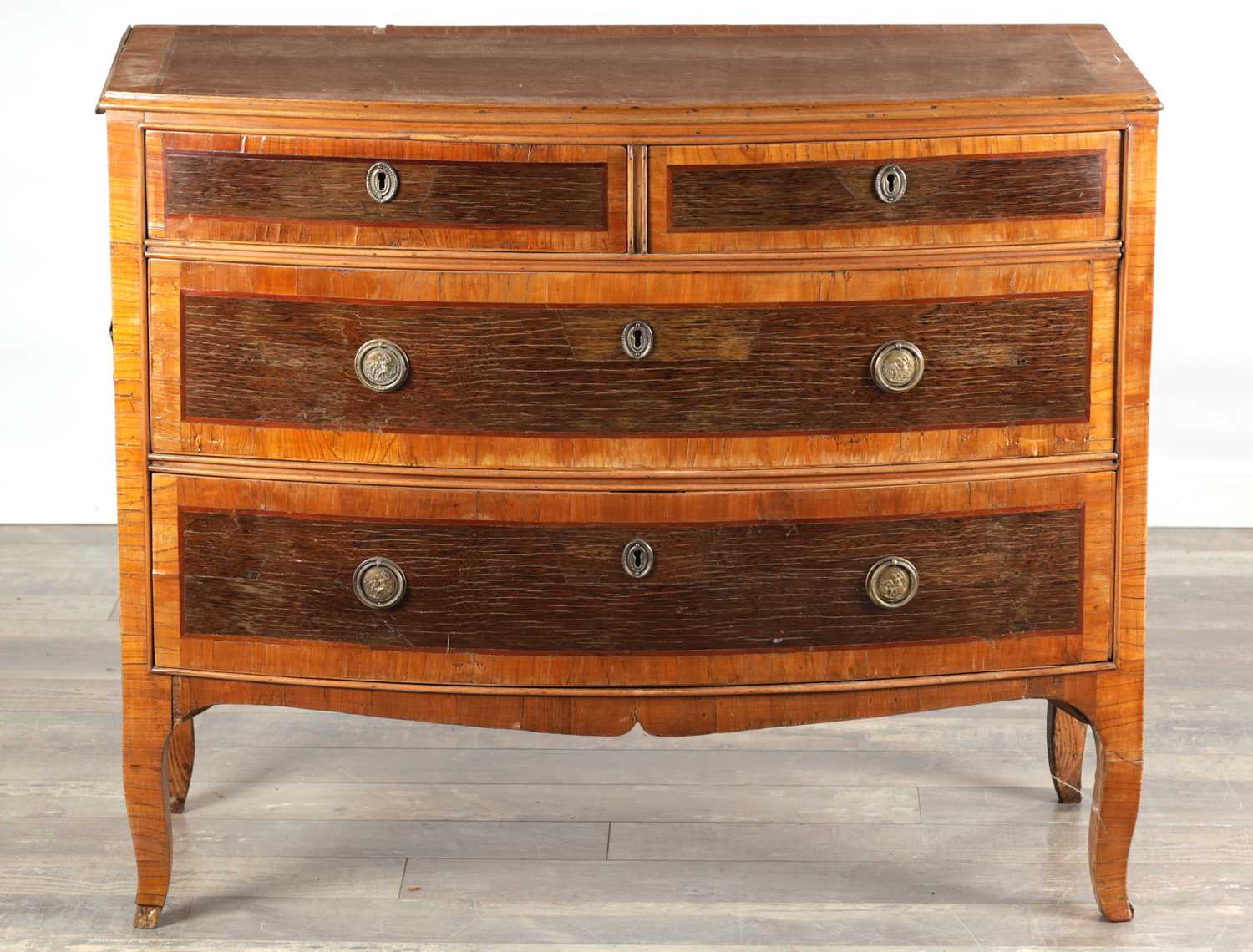 Lot 1537 - AN 18TH CENTURY CONTINENTAL ROSEWOOD AND SATINWOOD CROSS-BANDED BOW-FRONT CHEST OF DRAWERS