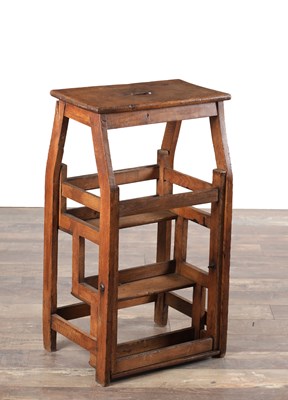 Lot 1581 - A 19TH CENTURY OAK METAMORPHIC STOOL / LIBRARY STEPS