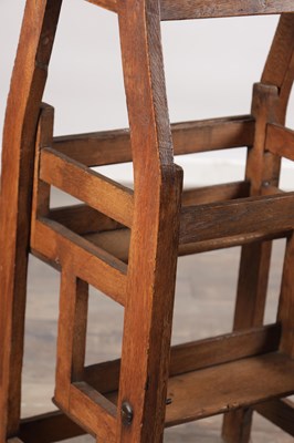 Lot 1581 - A 19TH CENTURY OAK METAMORPHIC STOOL / LIBRARY STEPS
