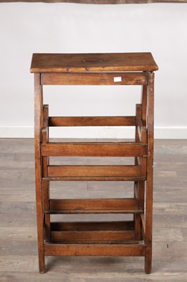 Lot 1581 - A 19TH CENTURY OAK METAMORPHIC STOOL / LIBRARY STEPS