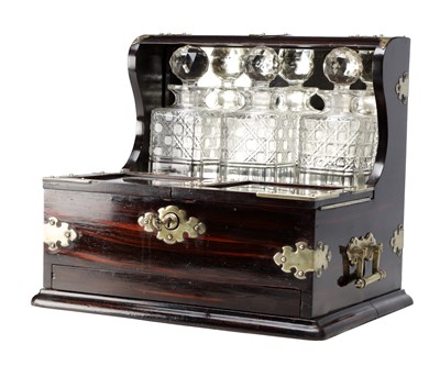 Lot 1084 - A VICTORIAN COROMANDEL AND BRASS MOUNTED DECANTER BOX WITH THREE CUT GLASS DECANTERS