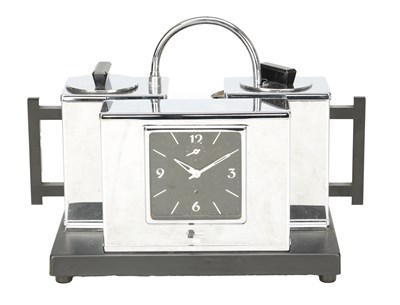 Lot 1261 - AN ART DECO STYLE L.G. HAWKINS CHROMIUM-PLATED TEASMADE ALARM CLOCK
