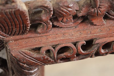 Lot 1547 - A CARVED HARDWOOD MIRROR