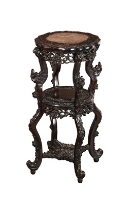 Lot 711 - A LATE 19TH CENTURY CHINESE CARVED HARDWOOD PLANT STAND WITH ROUGE MARBLE INSET