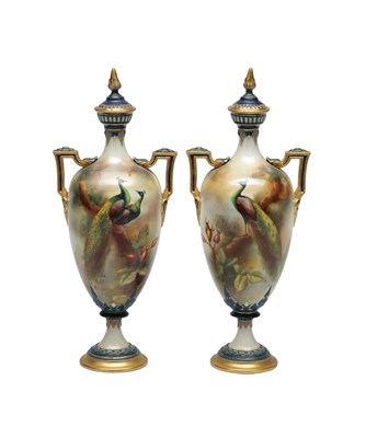 Lot 640 - A PAIR OF LATE 19TH CENTURY ROYAL WORCESTER PORCELAIN PEACOCK VASES AND COVERS