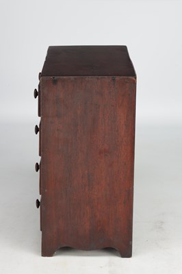 Lot 1597 - A 19TH CENTURY MAHOGANY MINIATURE CHEST OF DRAWERS