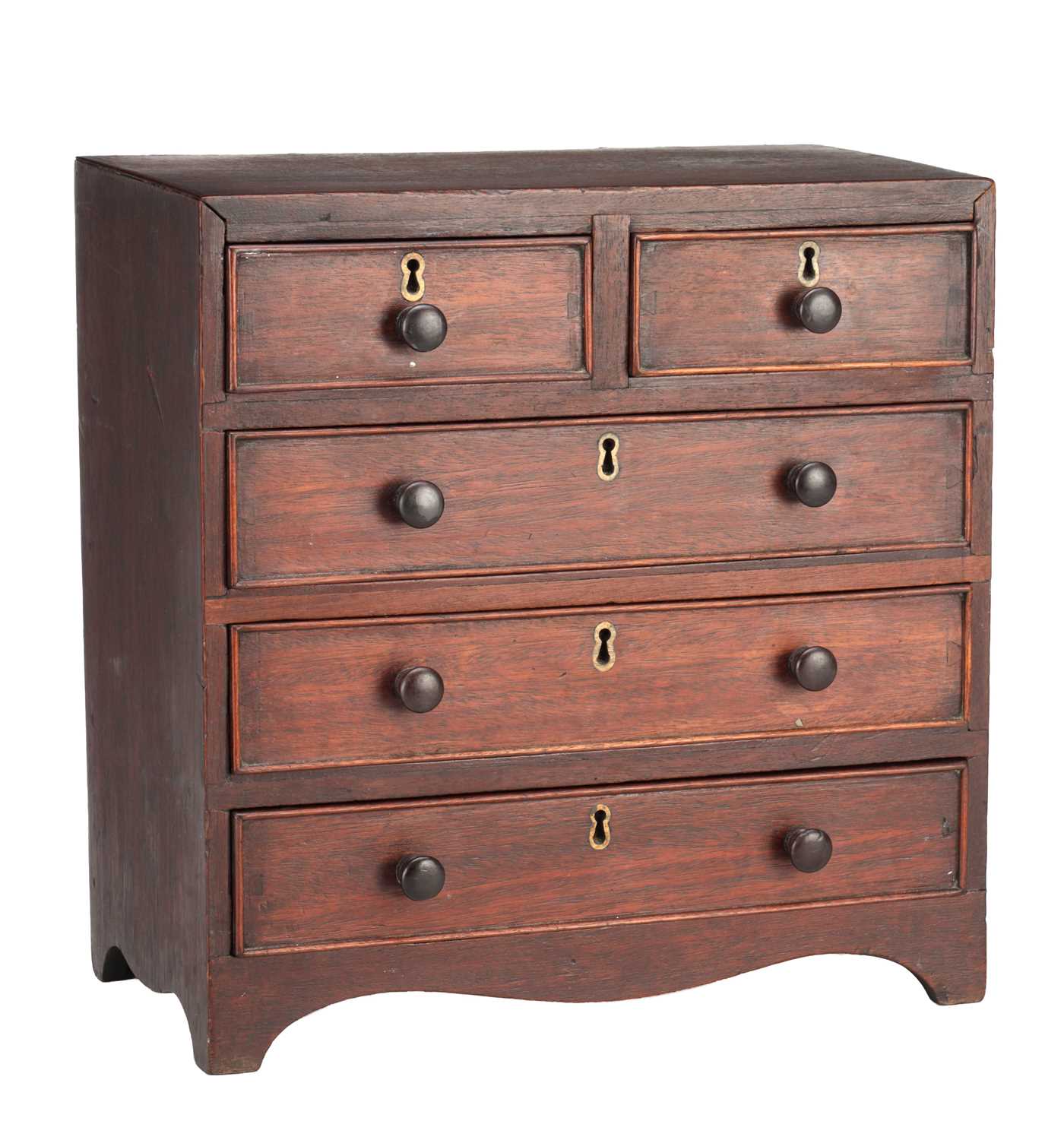 Lot 1597 - A 19TH CENTURY MAHOGANY MINIATURE CHEST OF DRAWERS