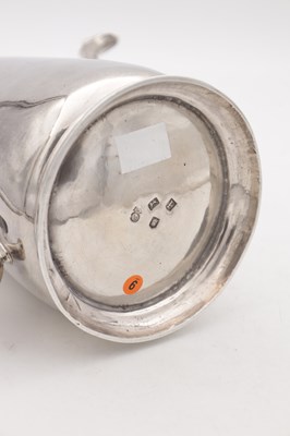 Lot 24 - A GEORGE II ENGLISH SILVER COFFEE POT