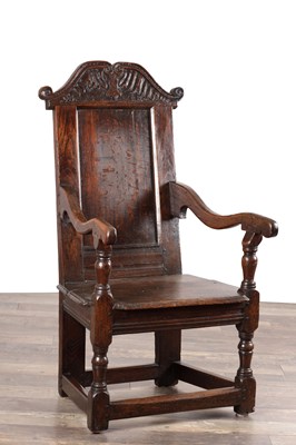 Lot 1676 - A 17TH CENTURY YORKSHIRE OAK WAINSCOT ARMCHAIR