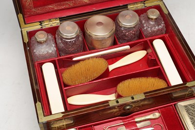 Lot 1386 - ASPREY OF LONDON A ROSEWOOD AND BRASS BOUND DRESSING CASE WITH SILVER GILT FITTINGS