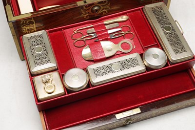 Lot 1386 - ASPREY OF LONDON A ROSEWOOD AND BRASS BOUND DRESSING CASE WITH SILVER GILT FITTINGS
