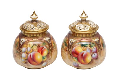 Lot 681 - A PAIR OF ROYAL WORCESTER FRUIT PAINTED PORCELAIN POT POURRI VASES AND COVERS