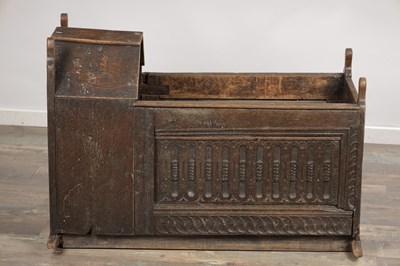 Lot 1527 - A 17TH CENTURY ENGLISH OAK HOODED ROCKING CRADLE