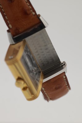 Lot 478 - A CIRCA 2000 JAEGER-LECOULTRE STEEL AND GOLD REVERSO MEMORY WRIST WATCH