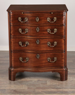 Lot 1515 - AN UNUSUAL GEORGE III STYLE MAHOGANY SERPENTINE CHEST OF DRAWERS WITH BRUSHING SLIDE