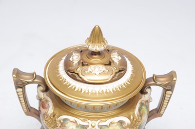 Lot 622 - H AYRTON A ROYAL WORCESTER PORCELAIN FRUIT PAINTED TWO HANDLED PEDESTAL VASE AND COVER