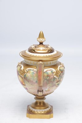 Lot 622 - H AYRTON A ROYAL WORCESTER PORCELAIN FRUIT PAINTED TWO HANDLED PEDESTAL VASE AND COVER