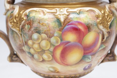 Lot 622 - H AYRTON A ROYAL WORCESTER PORCELAIN FRUIT PAINTED TWO HANDLED PEDESTAL VASE AND COVER