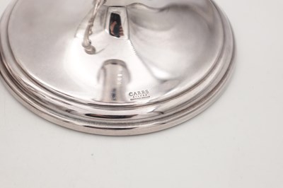 Lot 42 - A COLLECTION OF THREE EARLY 21ST CENTURY ENGLISH SILVER CANDLESTICKS BY CARRS