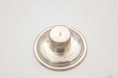Lot 42 - A COLLECTION OF THREE EARLY 21ST CENTURY ENGLISH SILVER CANDLESTICKS BY CARRS