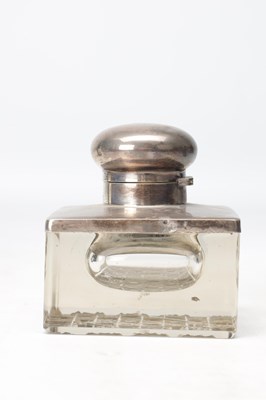 Lot 17 - A 1912 ENGLISH SILVER MOUNTED CUT GLASS INKWELL