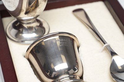 Lot 29 - TWO ENGLISH SILVER EGG CUPS AND A TEASPOON