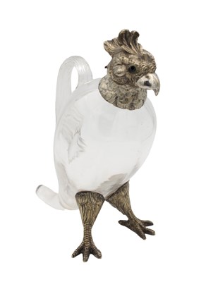 Lot 136 - A SILVER-PLATED ON NICKEL MOUNTED GLASS DECANTER JUG IN THE FORM OF A COCKATOO