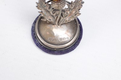 Lot 74 - A SET OF ELEVEN SCOTTISH SILVER THISTLE MENU HOLDERS