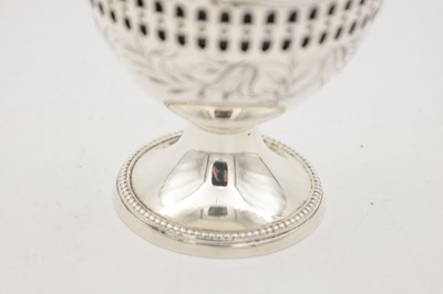 Lot 94 - A 19TH/20TH CENTURY SILVER SUGAR BASKET WITH BLUE GLASS LINER