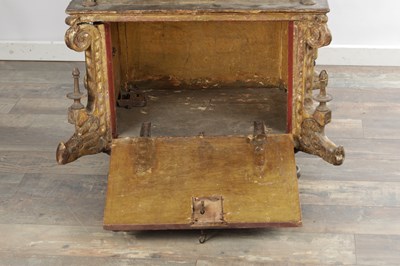 Lot 1528 - AN ITALIAN PARCEL GILT AND POLYCHROME CARVED WOOD CASSONE DOWRY CHEST