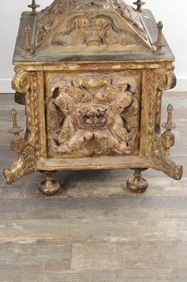 Lot 1528 - AN ITALIAN PARCEL GILT AND POLYCHROME CARVED WOOD CASSONE DOWRY CHEST