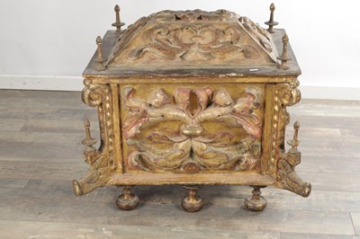Lot 1528 - AN ITALIAN PARCEL GILT AND POLYCHROME CARVED WOOD CASSONE DOWRY CHEST