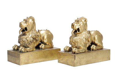 Lot 1091 - A PAIR OF 19TH CENTURY GILT BRONZE LION FIRE DOGS