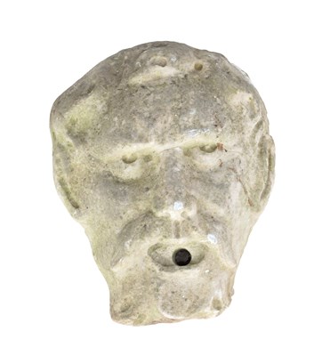 Lot 1068 - A CARVED MARBLE FOUNTAIN MASK OF A BEARDED MAN