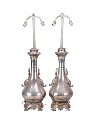 Lot 790 - A PAIR OF EASTERN SILVER PLATED TABLE LAMPS