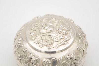 Lot 742 - AN EASTERN SILVER REPOUSSE LIDDED DISH