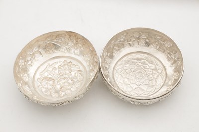 Lot 742 - AN EASTERN SILVER REPOUSSE LIDDED DISH