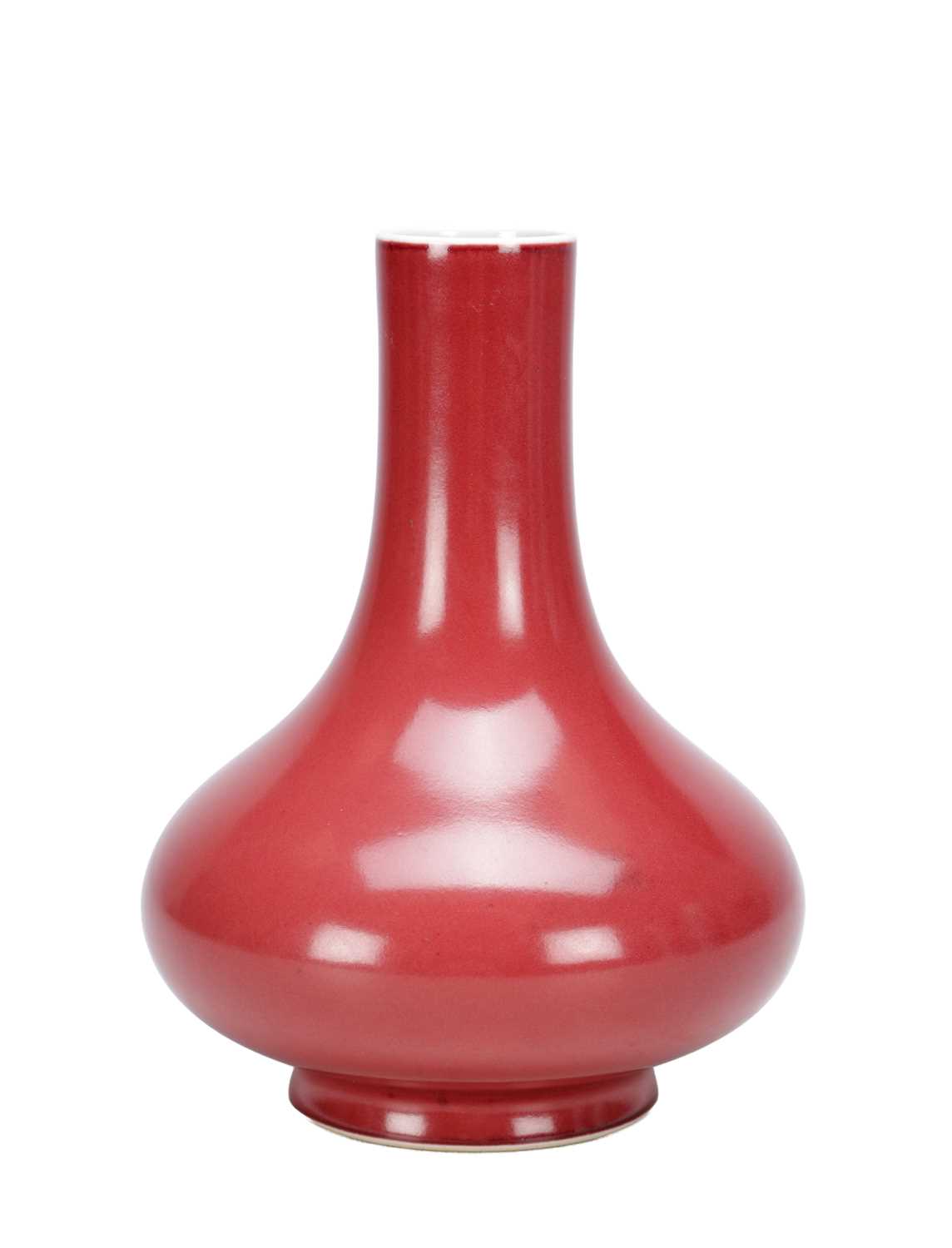 Lot 797 - A CHINESE SANG-DE-BOEUF GLAZED PORCELAIN BOTTLE VASE