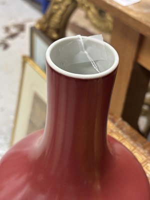 Lot 797 - A CHINESE SANG-DE-BOEUF GLAZED PORCELAIN BOTTLE VASE