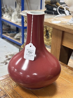 Lot 797 - A CHINESE SANG-DE-BOEUF GLAZED PORCELAIN BOTTLE VASE