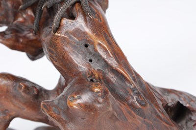 Lot 819 - A MEIJI PERIOD JAPANESE BRONZE MODEL OF A CROW ON A CARVED ROOT WOOD STAND
