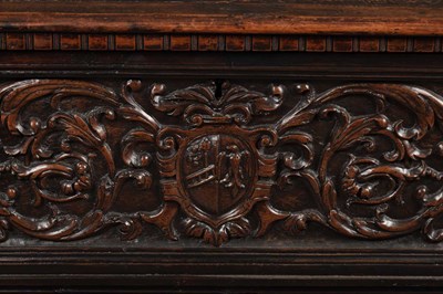 Lot 1562 - A 17TH CENTURY ITALIAN CARVED WALNUT CASSONE