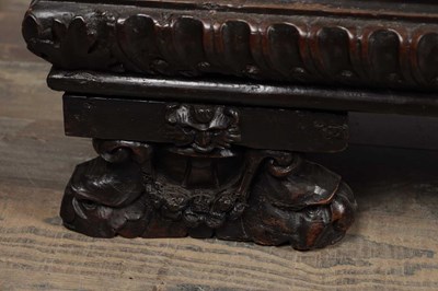 Lot 1562 - A 17TH CENTURY ITALIAN CARVED WALNUT CASSONE