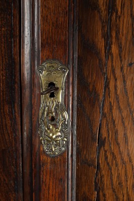 Lot 1530 - AN 18TH CENTURY STYLE WELSH OAK STANDING CORNER CUPBOARD