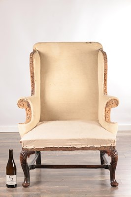 Lot 1513 - A RARE QUEEN ANNE PERIOD WALNUT WING-BACK CHAIR
