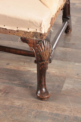 Lot 1513 - A RARE QUEEN ANNE PERIOD WALNUT WING-BACK CHAIR