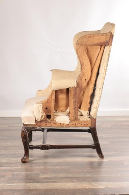 Lot 1513 - A RARE QUEEN ANNE PERIOD WALNUT WING-BACK CHAIR