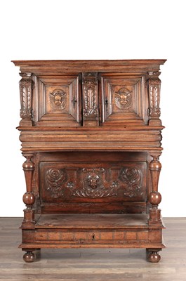 Lot 1678 - A 17TH CENTURY FRENCH WALNUT DRESSOIR CUPBOARD WITH POTBOARD CARVED WITH WINGED CHERUB HEADS