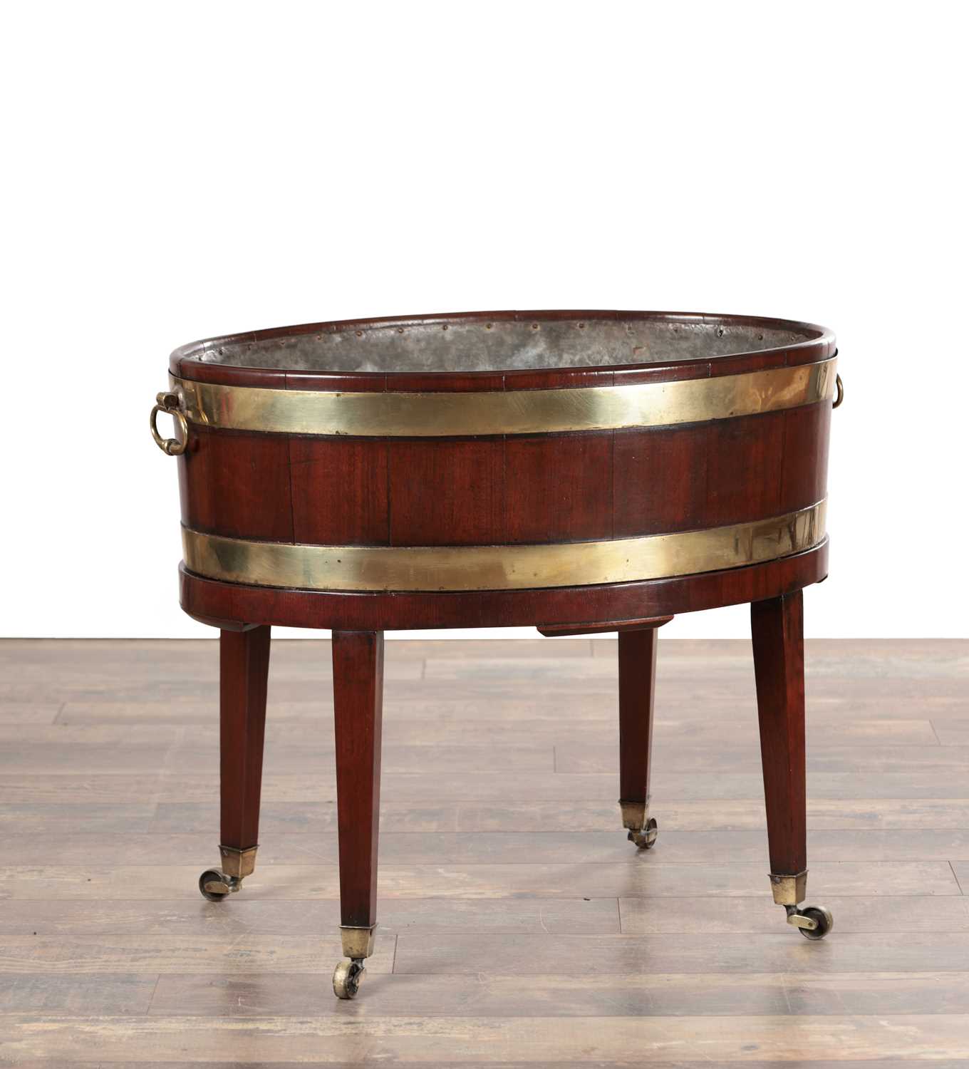 Lot 1575 - A GEORGE III MAHOGANY BRASS-BOUND WINE COOLER ON STAND