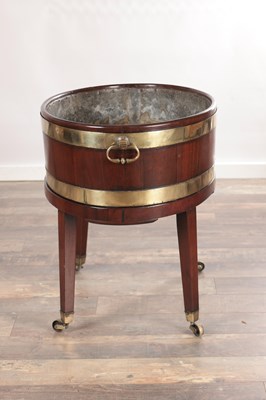 Lot 1575 - A GEORGE III MAHOGANY BRASS-BOUND WINE COOLER ON STAND